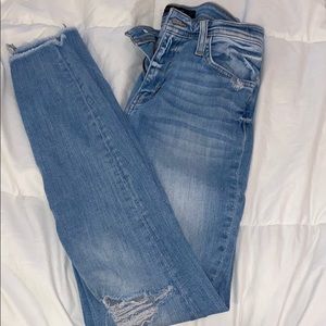 Light blue distressed jeans
